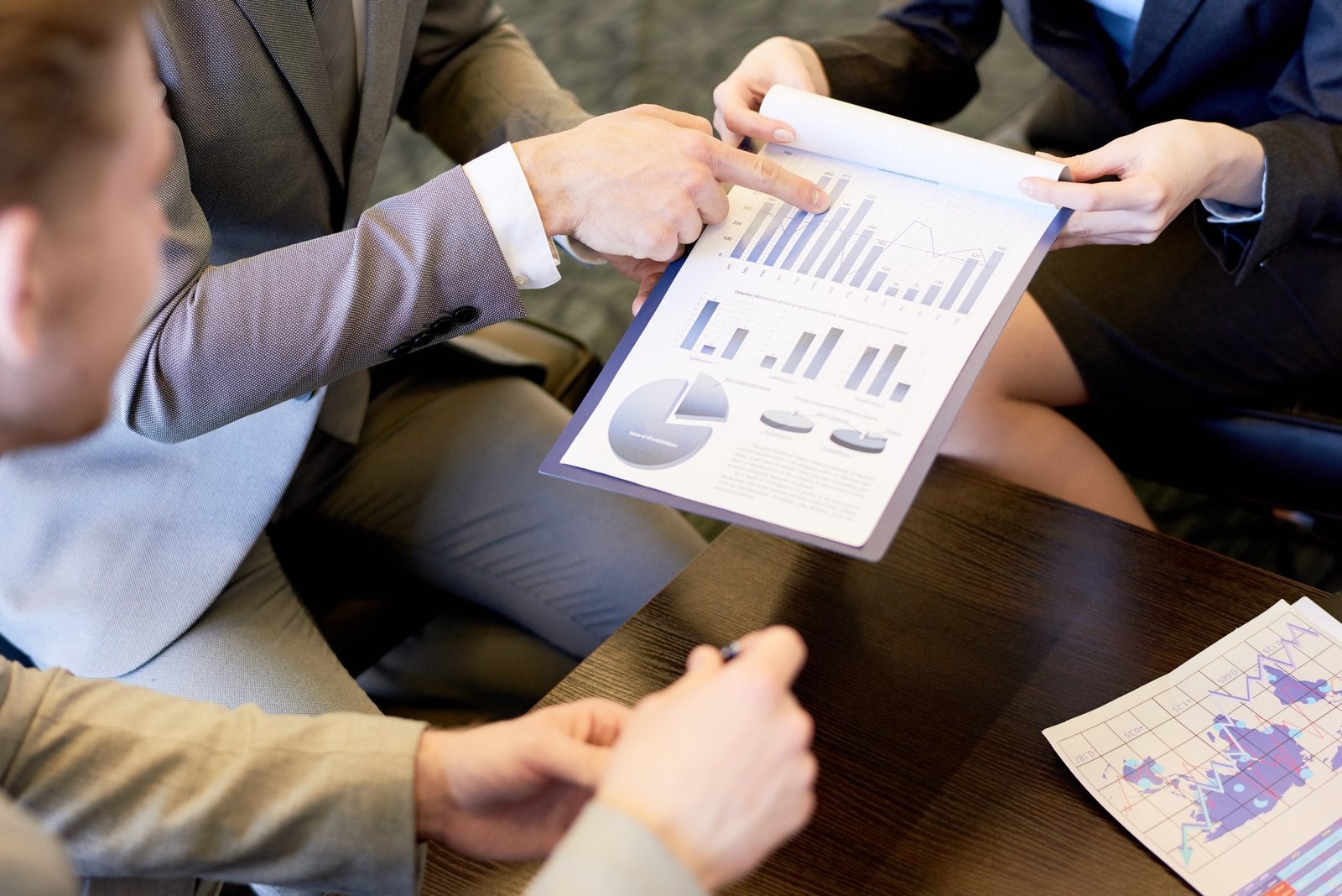 Professionals collaborating around a table